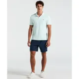 Polo celeste de tejido interlock, diseño liso con el logo Sticker Pete bordado al pecho, cuello clásico y tapeta con botones.