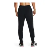 Pantalón de jogging gris jaspeado de Under Armour, modelo Rival Terry Jogger, para hombre. Confeccionado en tejido de felpa suave, con cintura elástica ajustable con cordón y logo de la marca estampado en la pierna izquierda.