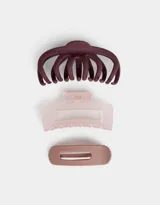 Set de tres accesorios para el pelo que incluye dos broches tipo pinza y un pasador.