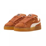 Championes Puma Suede XL, color azul con franja lateral blanca y detalles dorados.