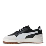 Championes urbanos Puma Shuffle Downtown, color negro con detalles en blanco y suela color caramelo.