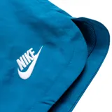 Short de baño azul con cintura elástica y cordón ajustable. Logo de Nike bordado en blanco en la pierna izquierda.