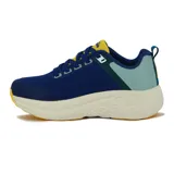 Championes deportivos Diadora modelo Bresh, para mujer, con capellada de malla en azul marino y detalles en amarillo, celeste y blanco. Presentan una suela gruesa con entresuela en color crema y una capa inferior en amarillo.