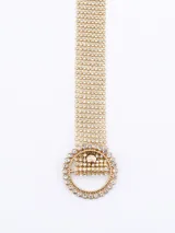 Cinto dorado con hebilla redonda con strass.