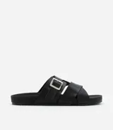 Sandalia slide city negra de material sintético, con tiras cruzadas y hebilla ajustable.