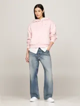Buzo Tommy Hilfiger color rosa, con capucha ajustable con cordón, mangas largas y logo bordado en el pecho.