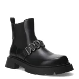 Botas Chelsea de mujer color negro, estilo robusto, con plataforma gruesa y suela track. Presentan un detalle de tira con hebillas metálicas circulares en el empeine.