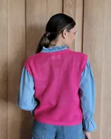 Musculosa de punto color fucsia.