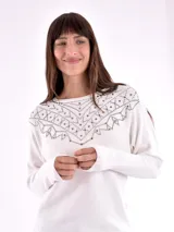 Buzo negro de tejido de punto con cuello redondo y mangas largas, decorado con apliques de strass en el canesú.