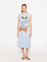 Túnica celeste de algodón con estampado de cuatro pares de lentes de sol de diferentes colores.