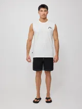 Musculosa blanca de algodón sin mangas, corte holgado y logo estampado en el pecho.