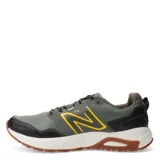 Championes New Balance Trial Running 410 V8, color verde oliva con detalles en negro y amarillo.