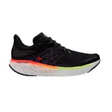 Championes de running New Balance, color negro con detalles en violeta, naranja y verde.