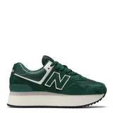 Championes urbanos New Balance modelo 574 con plataforma, color verde con detalles en blanco, confeccionados en gamuza y malla, con logo "N" característico en los laterales y entresuela ENCAP.
