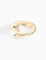 Brazalete de zinc con diseño ondulado, en color plateado, parte de la colección cápsula SYMPHORINE X VIC SARAVIA.