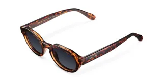 Gafas de sol unisex con montura carey geométrica, lentes polarizadas negras con protección UV400, varillas sobresalientes y diseño retro-chic.