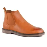 Bota Chelsea de cuero negro con elásticos laterales y tirador trasero.