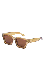 Lentes de sol color marrón con marco de policarbonato color miel y diseño geométrico.