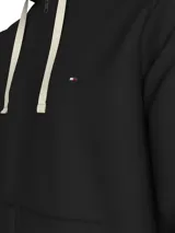 Buzo con cremallera de felpa color negro, con capucha y logo bordado en el pecho de Tommy Hilfiger.