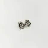 Par de aros de plata 925 con forma de corazón y circonias incrustadas.