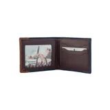 Billetera Terrano de cuero nobuk azul con detalle de cuero clásico marrón en el lateral.