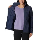 Polar de mujer Columbia, modelo Basin Trail III Full, color azul marino oscuro, con cierre frontal completo y cuello alto. Presenta paneles laterales en un tono de azul más oscuro.