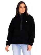 Buzo polar gris de mujer con cuello alto abotonado y bolsillo tipo canguro. Tiene un parche redondo con el logo de Cat en el lado izquierdo del pecho y broches con el logo de Cat en la parte delantera.