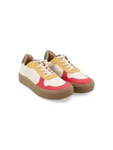 Zapatillas urbanas de cuero vacuno color dorado y naranja, con cordones de algodón y suela sintética.