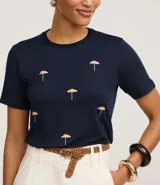 Blusa slim de mangas cortas, confeccionada en viscolycra, con cuello redondo y bordados de paraguas.