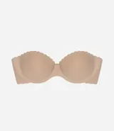 Soutien femenino liso color piel, modelo top sin tirantes, con relleno y borde festoneado.