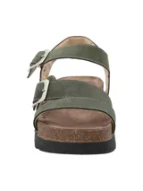 Sandalias de cuero color verde militar con plataforma de corcho y suela de goma negra. Presentan dos tiras anchas sobre el empeine y una tira alrededor del tobillo, todas ajustables con hebillas metálicas plateadas.