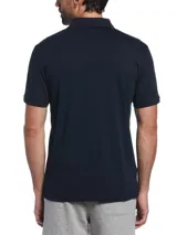 Polo azul marino de tejido interlock suave y durable, con cuello acanalado, tapeta con botones y logo Sticker Pete bordado al pecho.