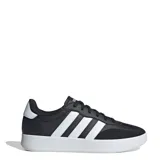 Championes Adidas Urban Barreda T negros con las tres tiras blancas.