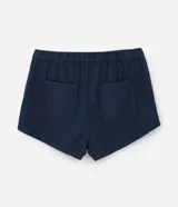 Short pollera azul marino de sarga de algodón, con tres botones dorados en el frente. Corte evasé.