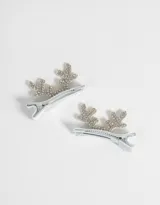 Set de dos hebillas plateadas para el pelo con forma de cuernos de reno y apliques de strass.