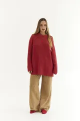 Sweater de punto acanalado con mangas raglán y logo en el pecho, confeccionado en 100% algodón.