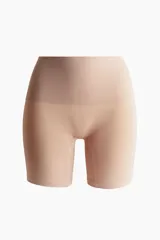 Culotte color piel con efecto moldeador en cintura, muslos y glúteos. Modelo de tiro alto con refuerzo interior y diseño seamless.