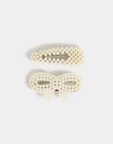 Set de dos hebillas tic tac para el pelo, una con forma triangular y otra con forma de moño, ambas decoradas con perlas.