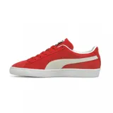 Championes Puma Suede Classic de gamuza color verde con franja lateral blanca y suela de goma blanca.