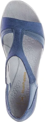 Sandalias Hush Puppies color gris con detalles en verde agua, con suela liviana y flexible.