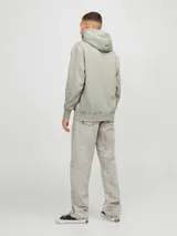 Canguro verde oliva de manga larga con capucha y fit regular. Tiene un bolsillo tipo canguro y estampado de goma con la palabra "Originals".