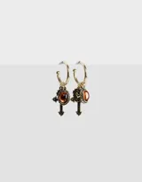 Aros tipo argolla dorados con strass, dije de cruz y corazón estilo antique con piedra color naranja.