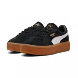 Championes Puma Palermo Elevata, color negro con franja blanca y suela marrón.