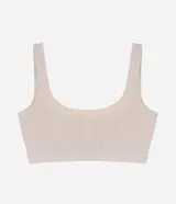 Soutien top color piel, confeccionado en poliamida con acabado seamless, escote en U y breteles anchos fijos.