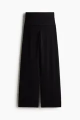 Pantalón negro de punto suave con piernas amplias y cintura plegable con laterales fruncidos para un efecto drapeado suave.