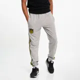 Pantalón con puño gris, con detalles en franjas amarillas y negras, ideal para deportes.