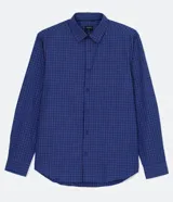 Camisa de manga larga azul con estampado de cuadrillé vichy en blanco y rojo, de corte comfort. Confeccionada en tejido plano de algodón y poliéster.