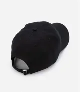 Gorra negra de sarga con ala curva y bordado frontal con las iniciales NY.