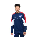 Buzo deportivo azul marino con detalles en blanco y rojo en mangas y hombros. Presenta el logo de Umbro bordado en el pecho y el escudo del Club Nacional de Football.