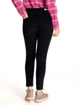 Pantalón skinny fit de tiro medio, confeccionado con tecnología Natural Flex para mayor comodidad y flexibilidad.